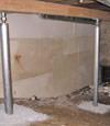 A system of crawl space support posts adding structural support to a crawl space in East Farms