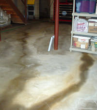Flooding entering a basement through a floor crack in Liberty Lake