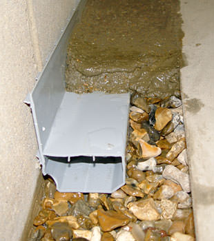 A basement drain system installed in a Veradale home
