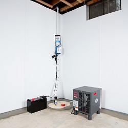Sump pump system, dehumidifier, and basement wall panels installed during a sump pump installation in Greenacres