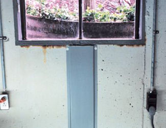 Repaired waterproofed basement window leak in Hayden